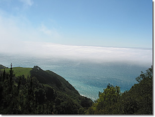 Photograph of a dramatic view of the Pacific Ocean, taken from the terrace at Nepenthe restaurant in Big Sur, California. Image copyright © Philip W. Tyo 2008
