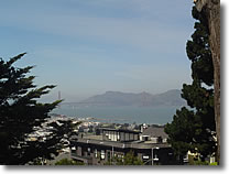 A photograph of San Francisco bay and the Golden Gate Bridge taken from George Sterling Park in San Francisco, California.  Image copyright © Philip W. Tyo 2007