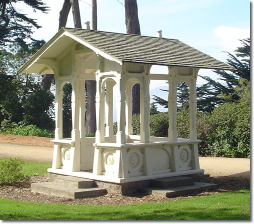 A photograph of a small wooden structure used as a resting place in Sutro Heights Park in San Francisco, California.  Image copyright © Philip W. Tyo 2007